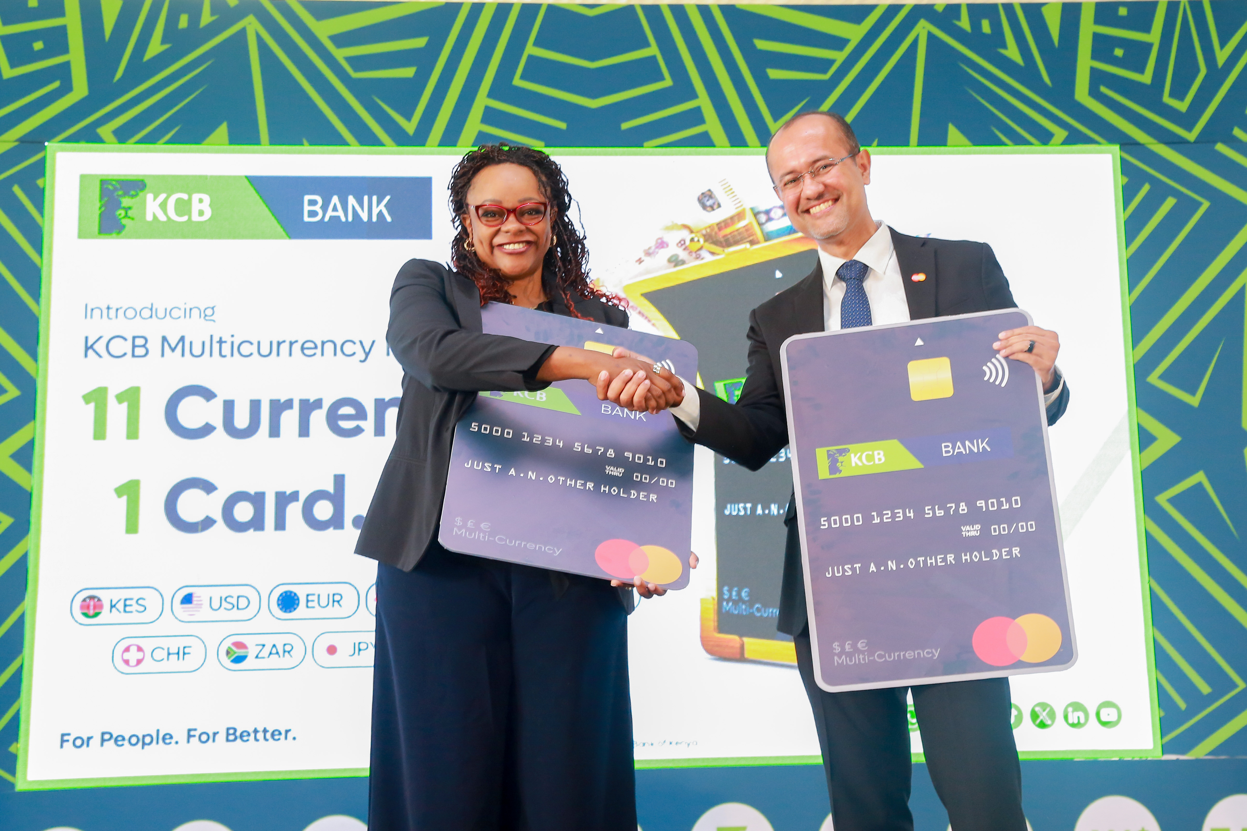 Angela Mwirigi, Director of Digital Financial Services at KCB Bank Kenya and Shehryar Ali, Senior Vice President and Country Manager for East Africa and Indian Ocean Islands at Mastercard pose for a photo during the KCB Multicurrency Prepaid Card Launch at Nairobi Royal Golf Club.