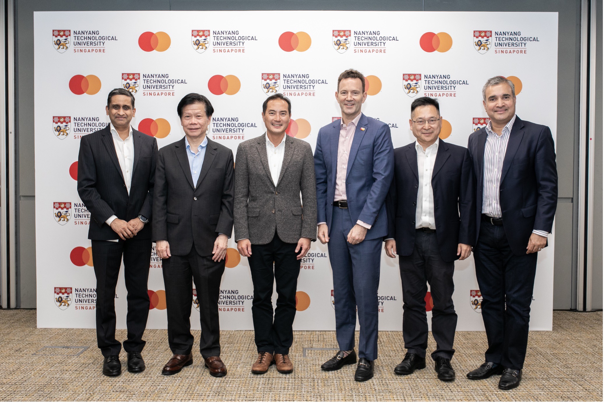 (L-R): Karthik Ramanathan, Senior Vice President, Cyber & Intelligence Solutions, Asia Pacific, Mastercard; Professor Lam Khin Yong, Vice President (Industry) of NTU Singapore; Senior Minister of State Tan Kiat How, Ministry of Communications and Information; Matthew Driver, Executive Vice President, Head of Services, Asia Pacific, Mastercard; Professor Lam Kwok Yan, Executive Director, Digital Trust Centre, NTU Singapore; Ari Sarker, President, Asia Pacific, Mastercard, celebrating the successful industry-academia collaboration to strengthen cyber expertise in Asia Pacific.