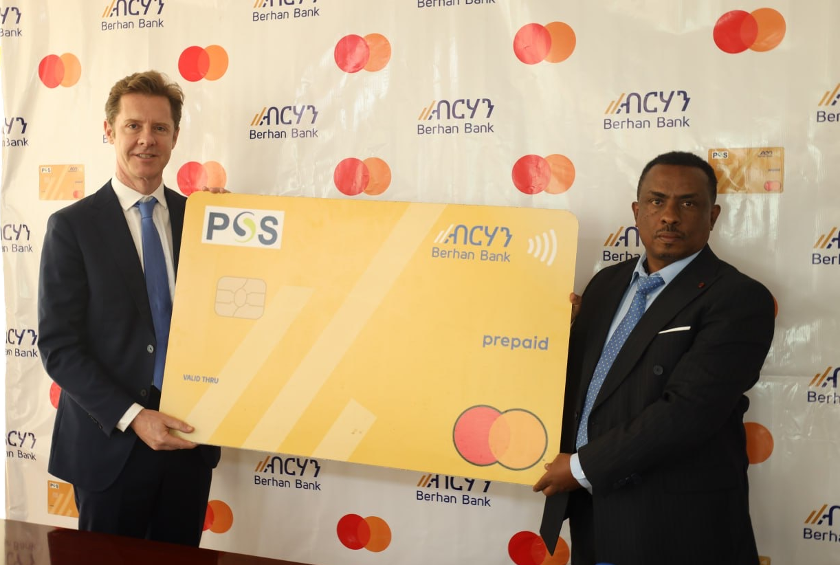 Mark Elliott, Division President, Africa at Mastercard (L) and Ato Ermias Tefera, President and CEO of Berhan Bank (R) during the launch of their co-branded prepaid card which will enable international digital payments by cardholders.